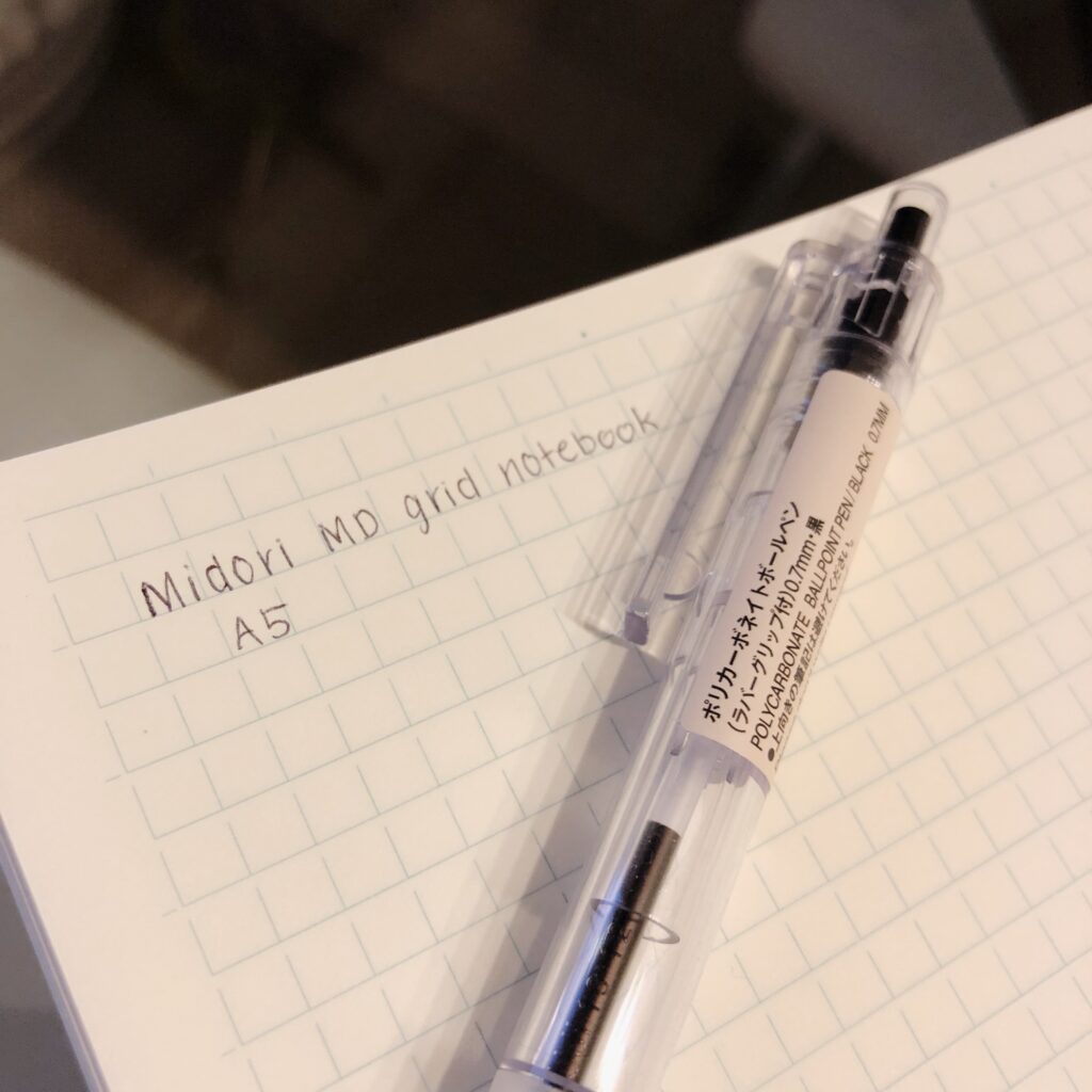 Midori md grid notebook in a5 with writing - notes